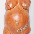 ceramics sculpture of pregnant woman